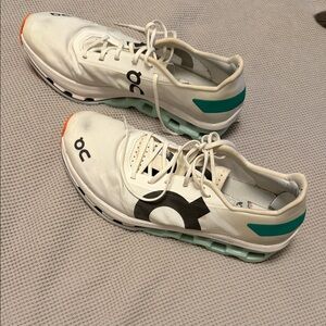 Women’s On Running White and Teal Athletic Sneakers